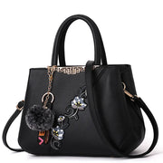 Embroidered PU Leather Shoulder Bag – Structured Frame Tote with Floral Details