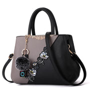 Embroidered PU Leather Shoulder Bag – Structured Frame Tote with Floral Details