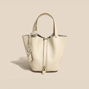 Genuine Cowhide Leather Bucket Bag - Fashion Lock Handbag with Phone Pocket | OWNLUXE