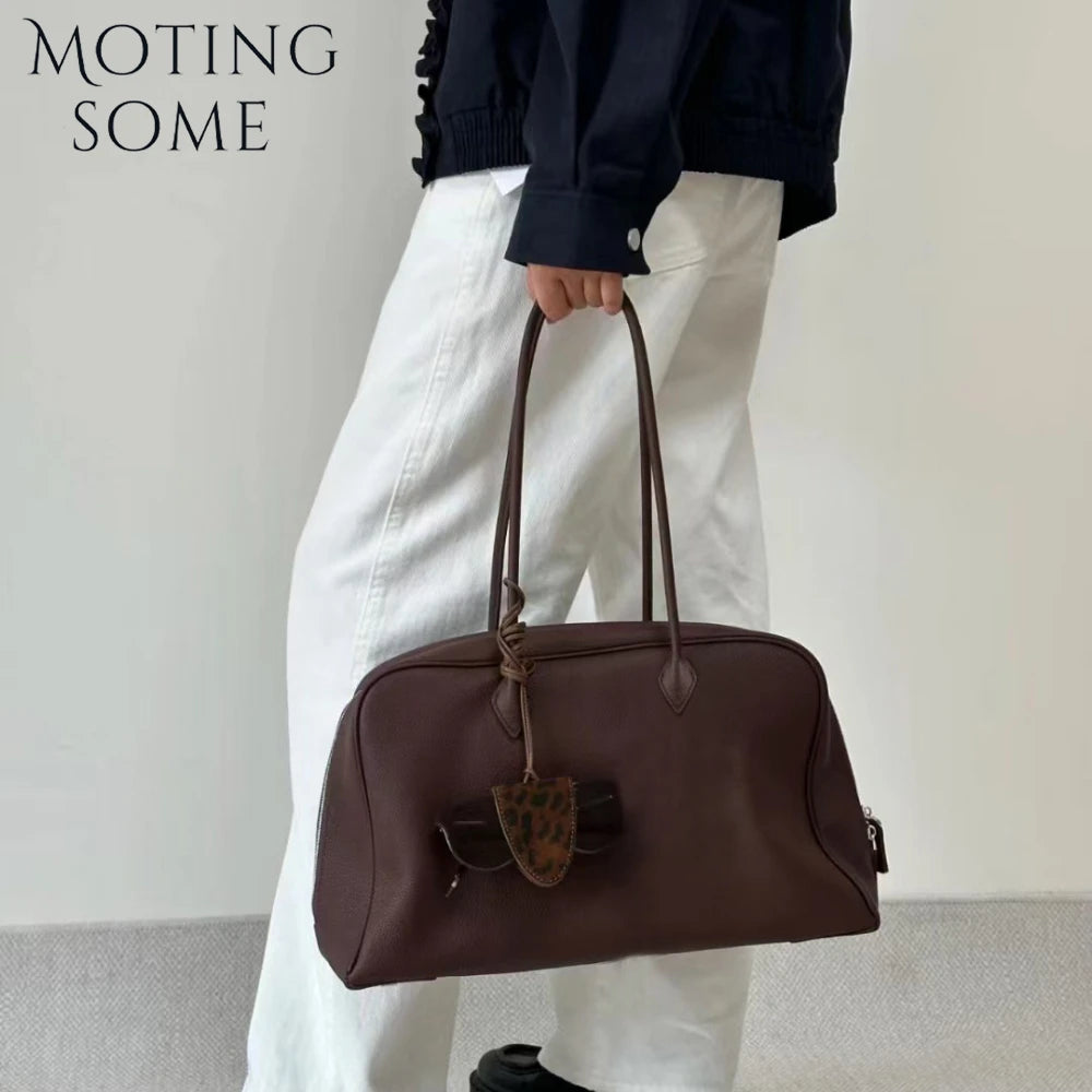 Cowhide Leather Handbag | OWNLUXE