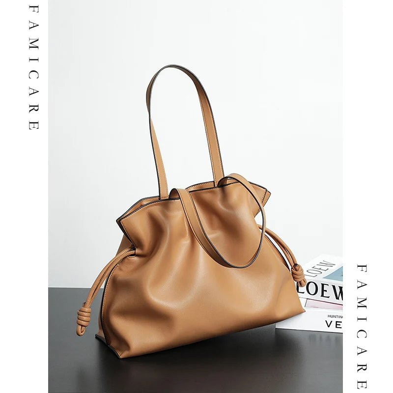 Cowhide Leather Pleated Bucket Bag | OWNLUXE