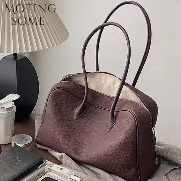 Cowhide Leather Handbag – Shop at OWNLUXE