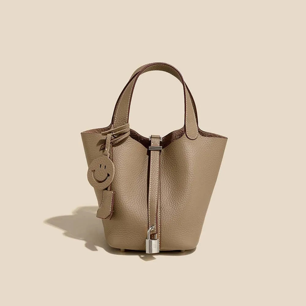 Genuine Cowhide Leather Bucket Bag - Fashion Lock Handbag with Phone Pocket | OWNLUXE