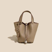 Genuine Cowhide Leather Bucket Bag - Fashion Lock Handbag with Phone Pocket | OWNLUXE