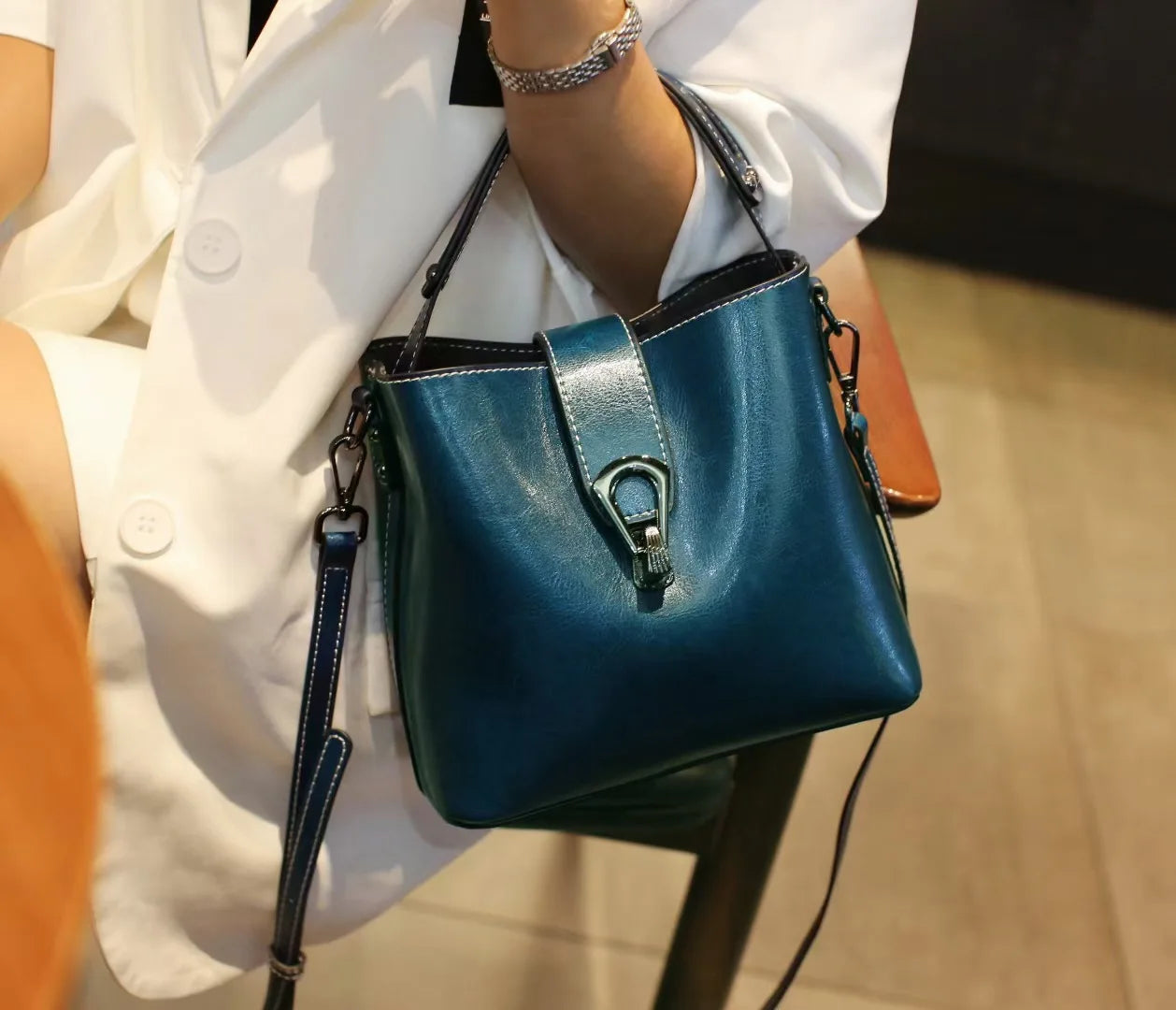 Spacious Cowhide Leather Bucket Bag | OWNLUXE
