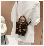 Load image into Gallery viewer, Retro New Handbag Floral Casual Women's Mini Bucket Bag Lock Buckle Opening Daily Match Single Shoulder Crossbody Bag
