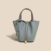 Genuine Cowhide Leather Bucket Bag - Fashion Lock Handbag with Phone Pocket | OWNLUXE