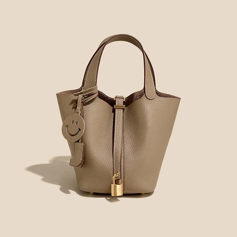 Genuine Cowhide Leather Bucket Bag - Fashion Lock Handbag with Phone Pocket | OWNLUXE