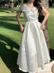 Midi Bow A-Line Dress | OWNLUXE